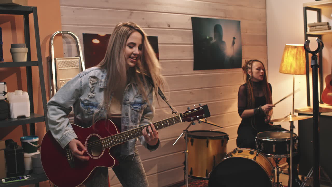 Girl Rocking Out While Playing Guitar