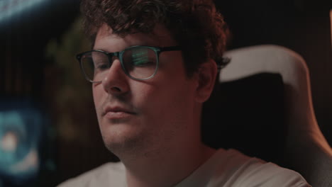 man focused on a computer game