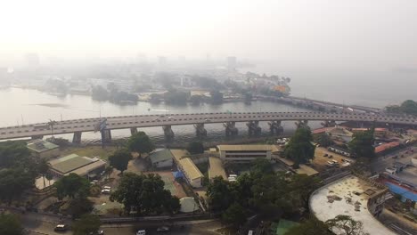 Aerial-shot-over-Lagos-Island,-with-the-Lagos-Lagoon-in-view