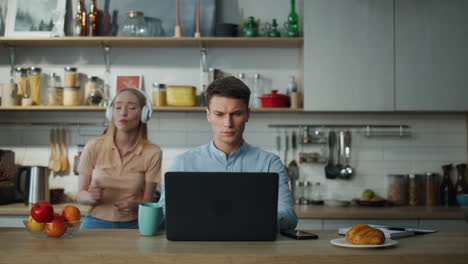 writer working home laptop drinking coffee. woman dancing watching on computer.