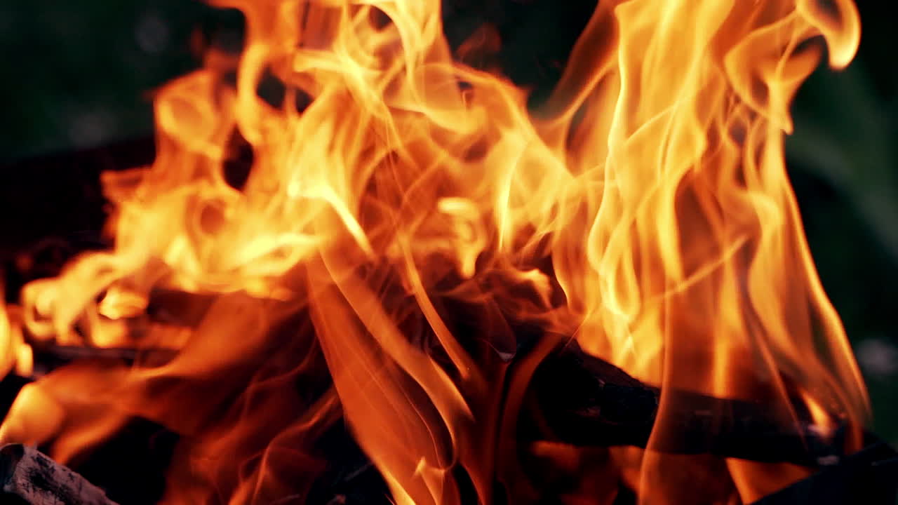 Big campfire at the dark. Close up view of big outdoor bonfire