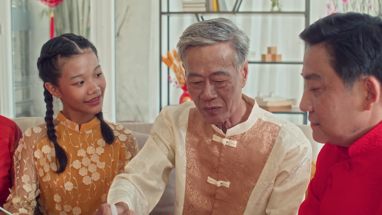 Big Vietnamese Family Writing Calligraphy on Tet Celebration