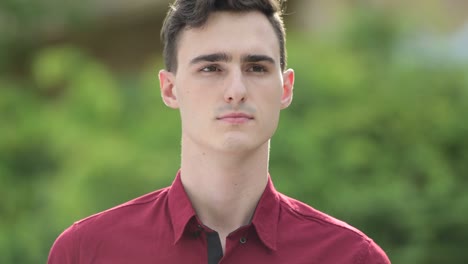 young handsome businessman thinking in the streets outdoors