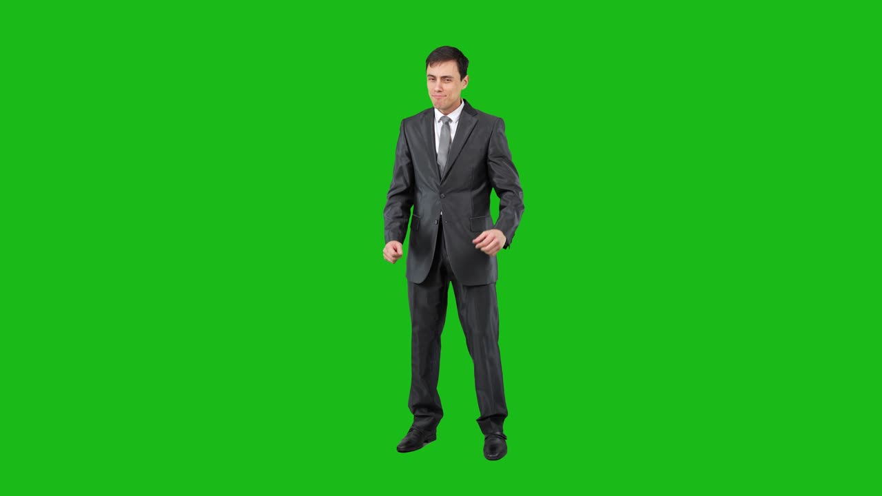 Man in Suit Singing or Speaking on Green Screen