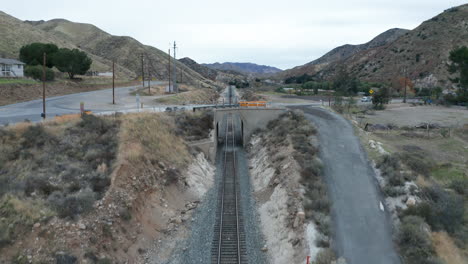 descending onto empty train tracks in soledad, california