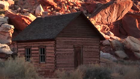 slow panup of a historic log oneroom schoolhouse in capital reef national park