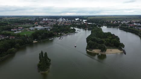 aerial view on boat sailing on the lake in kruszwica poland europe