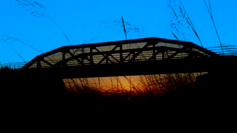 HD-The-Colony,-The-Tribute,-American-Bridge-boom-at-sunrise