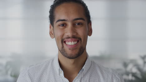 close-up-portrait-happy-young-hispanic-businessman-smiling-enjoying-professional-career-success-slow-motion