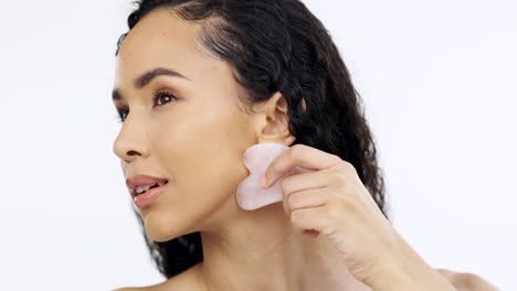 black woman, face and beauty with gua sha