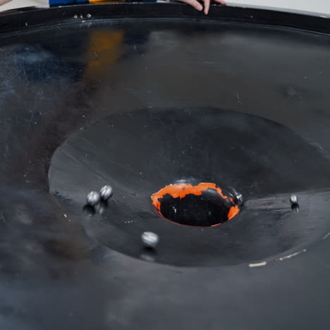 boy in the museum science. gravitational field model of black hole