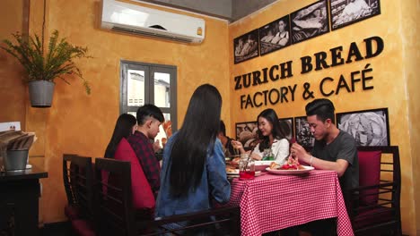 group of friends having lunch at zurich bread factory & cafe