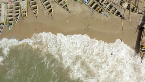 Awesome-reveal-of-packed-canoe-with-the-sea-waves