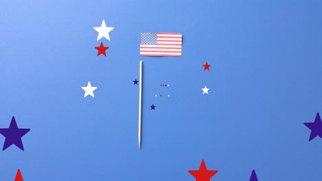 animation of stars falling over flag of united states of america on blue background