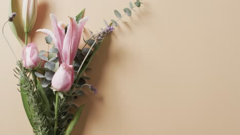 Video-of-bunch-of-white-and-pink-flowers-and-copy-space-on-yellow-background