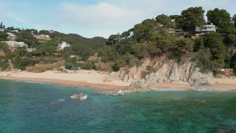 costa brava with these stunning aerial images of a paradisiacal beach in tossa de mar
