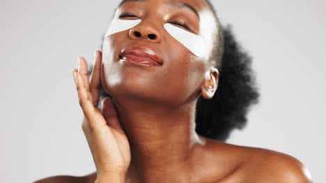 Skincare,-face-and-black-woman-with-eye-patches