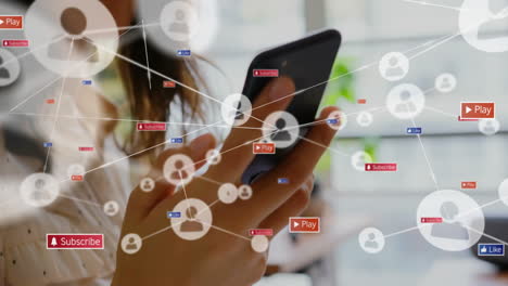 using smartphone with animation of social media icons and network connections