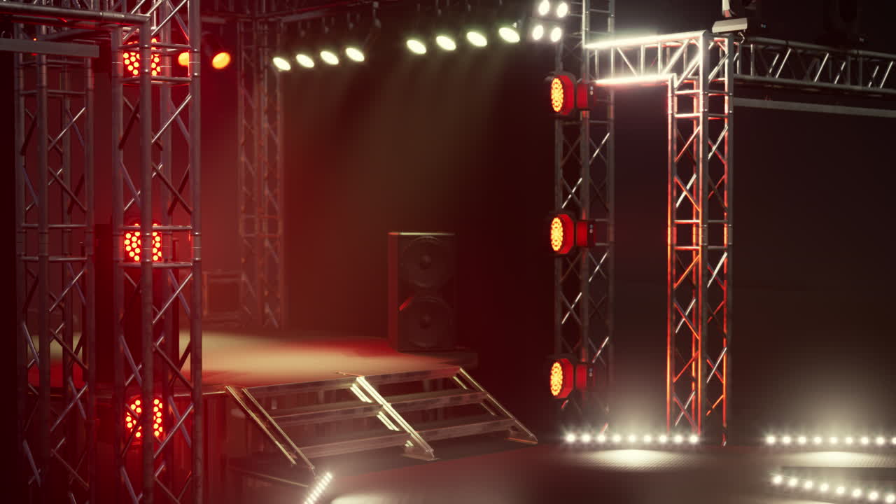 escenario vacío con equipo de iluminación y sonido