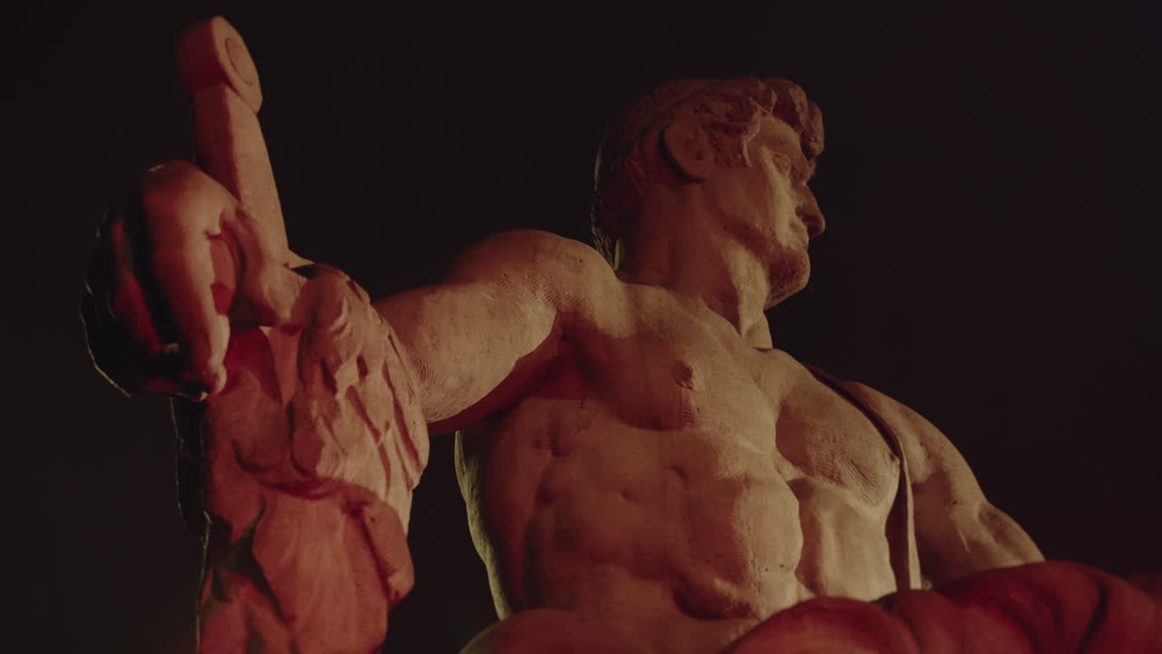 Epic, ancient stone statue at night