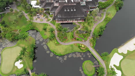 top down aerial view of golf course and country club house