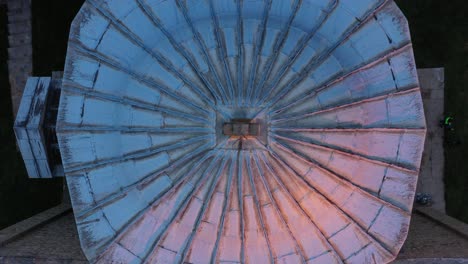 top view of a rounded-shape dome with a cross of old serbian orthodox church in novi pazar, serbia - overhead shot