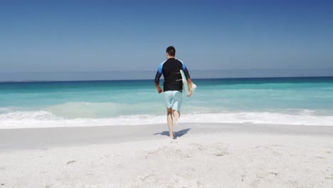 man running on the beach