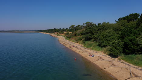 Aerial-flying-towards-Lepe-Beach-coast-Sunny-Day-UK-4K