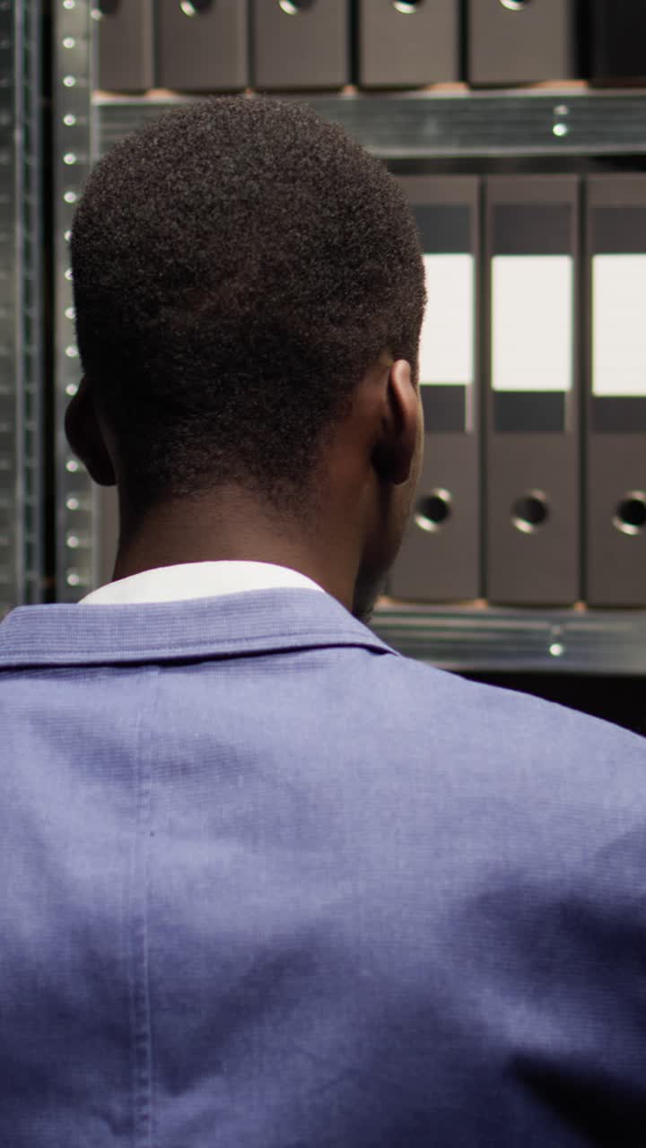 Man Looking at Files