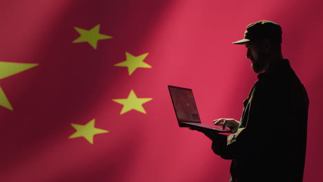 chinese air defense operator using radar system on laptop to detect missiles