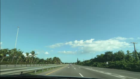dominican republic, carretera east november 2022 pov driving on highway in a car daylight