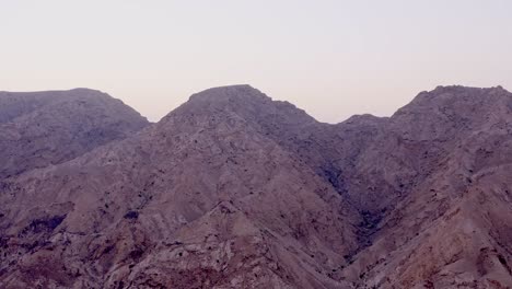 4k drone footage, aerial view of fossil rocks plateau in mleiha desert with sand ripples, geological landscape of the sphinx in sand dunes desert in the united arab emirates, drone videos