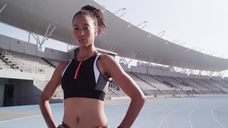 female athlete at track and field stadium