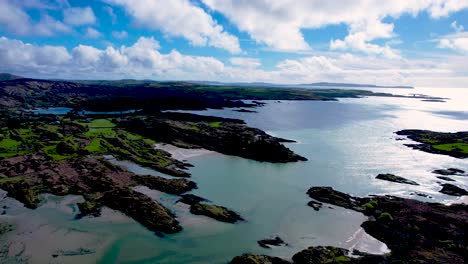 a 4k sweaping downward shot from above kealfadda bridge west cork mizen peninsula