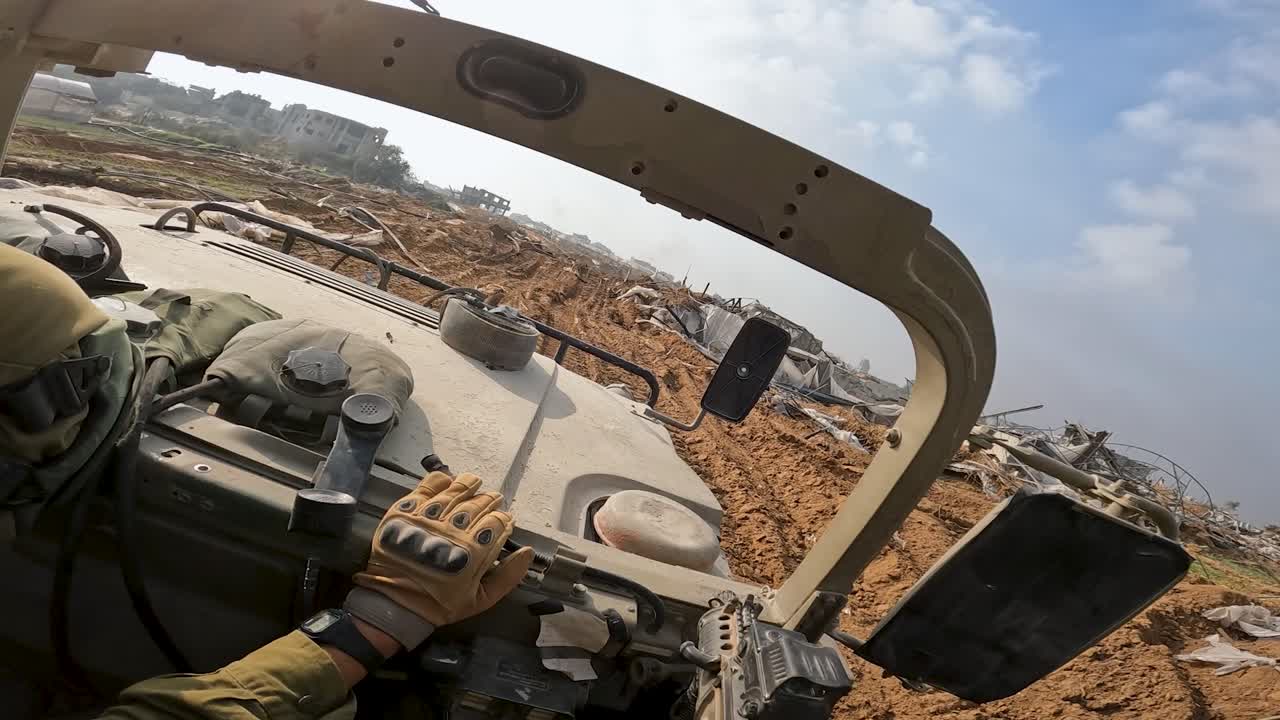 Point of view shot of a military car driving on the streets of Gaza during the Israel-Hamas War 2023