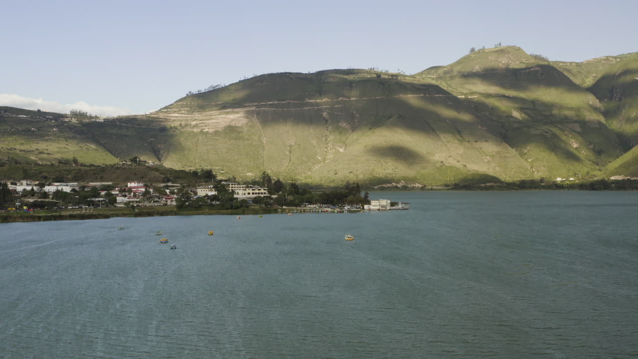 Scenic Lake Landscape with Mountains and Lakeside Town