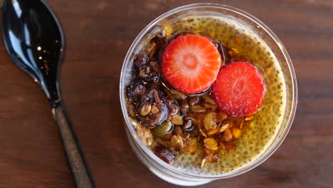 delicious chia pudding with strawberries and granola