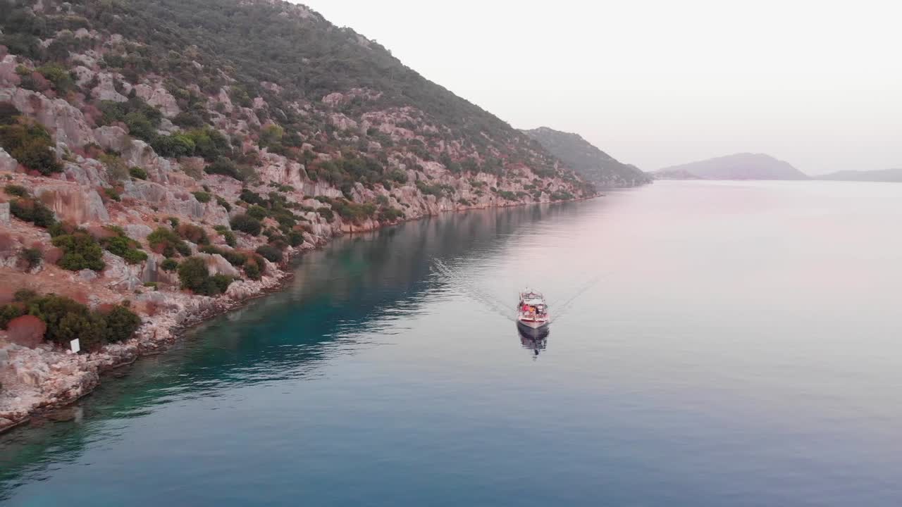 Boat adventure by the rocky ancient mountains of Phaselis in Turkey -aerial