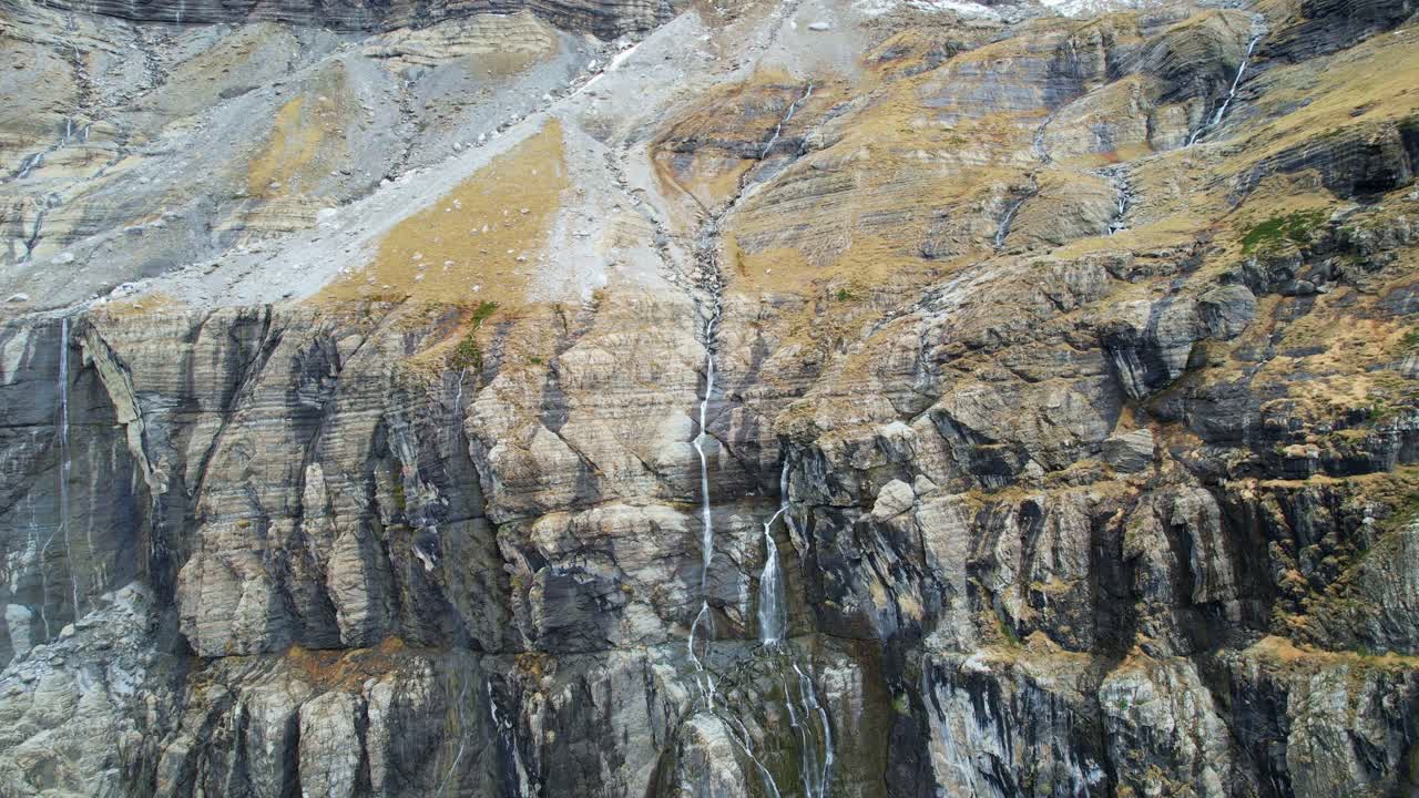Stunning aerial of Gavarnie cirque with limestone peaks and waterfalls