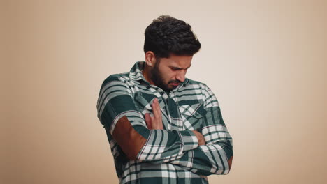 offended sad indian man having frustrated after quarrel fail lose ignores does not want to talk