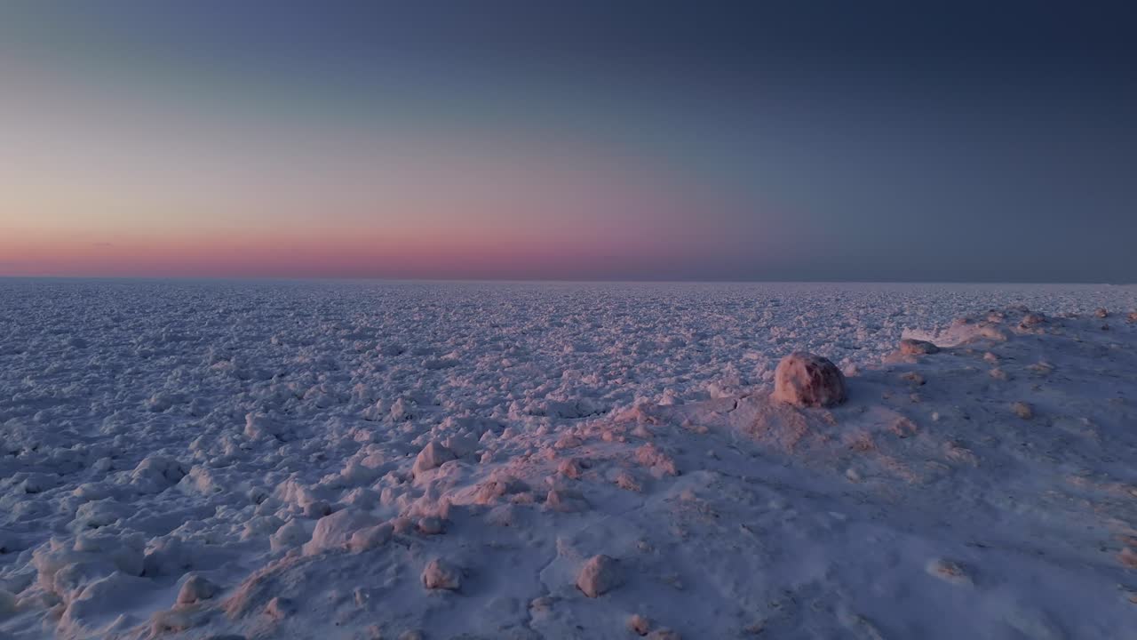 Capture dramatic aerial drone footage of melting Arctic ice, showcasing the effects of climate change and the rising sea levels threatening this vulnerable region.