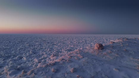 capture dramatic aerial drone footage of melting arctic ice, showcasing the effects of climate change and the rising sea levels threatening this vulnerable region.