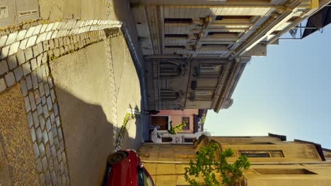 Slow-FPV-Pan-Across-Cobblestone-Street-Of-Concha-y-Toro-Neighborhood,-Santiago-Chile