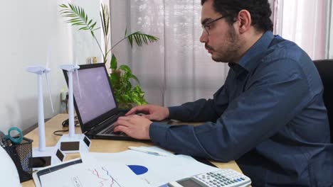 engineer working from home on a renewable energy project