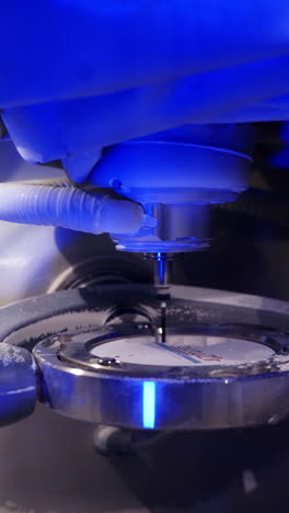 automated dental machine. highly productive automated dental milling machine working. close-up. vertical video