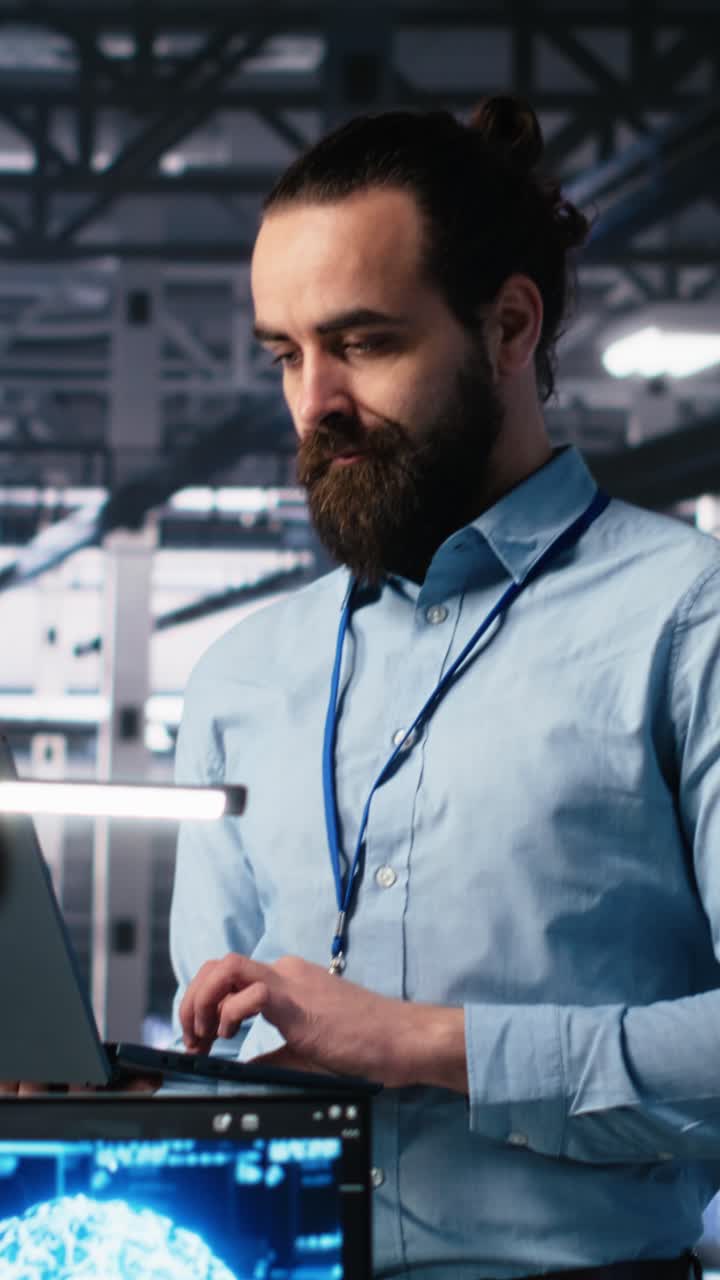 Vertical video Manager supervising work of server room engineer using AI