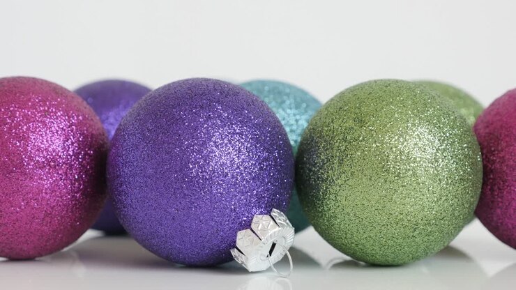 Fairy lights and Christmas balls with sequins 4K close-up video