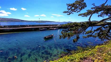 Ireland-Epic-locations-sheltered-little-fishing-harbour-with-boats-and-crystal-clear-sea,Sheep’s-Head-Peninsula-in-West-Cork-on-The-Wild-Atlantic-Way