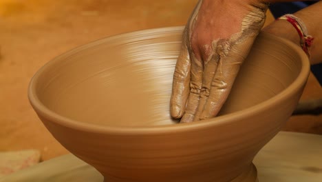 Potter-at-work-makes-ceramic-dishes.-India,-Rajasthan.