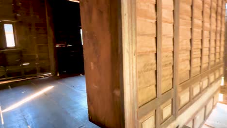 sunlight streaming through wooden house windows